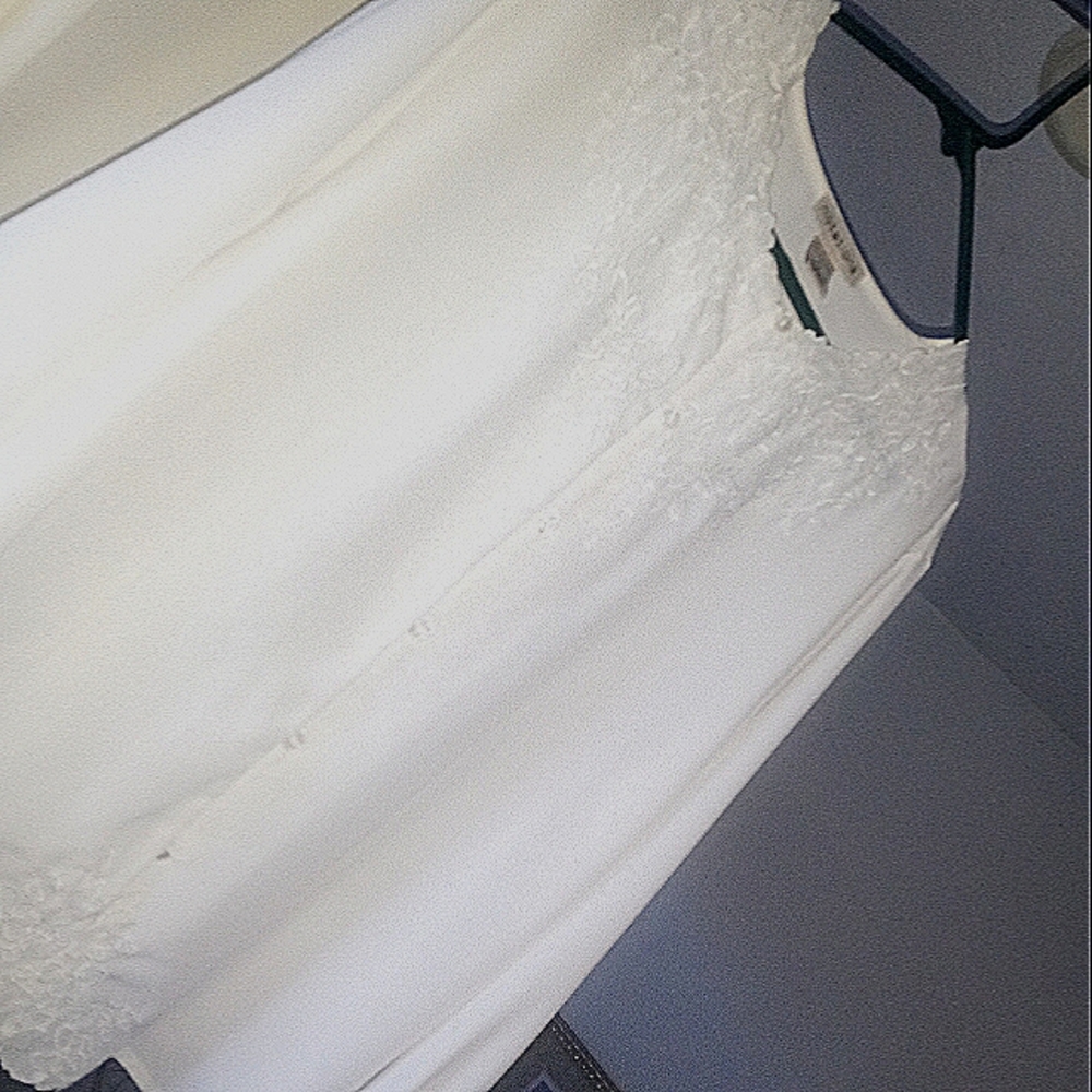 White embroidered button up blouse